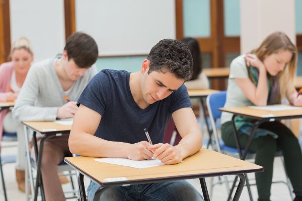 Student sitting a maths admissions exam